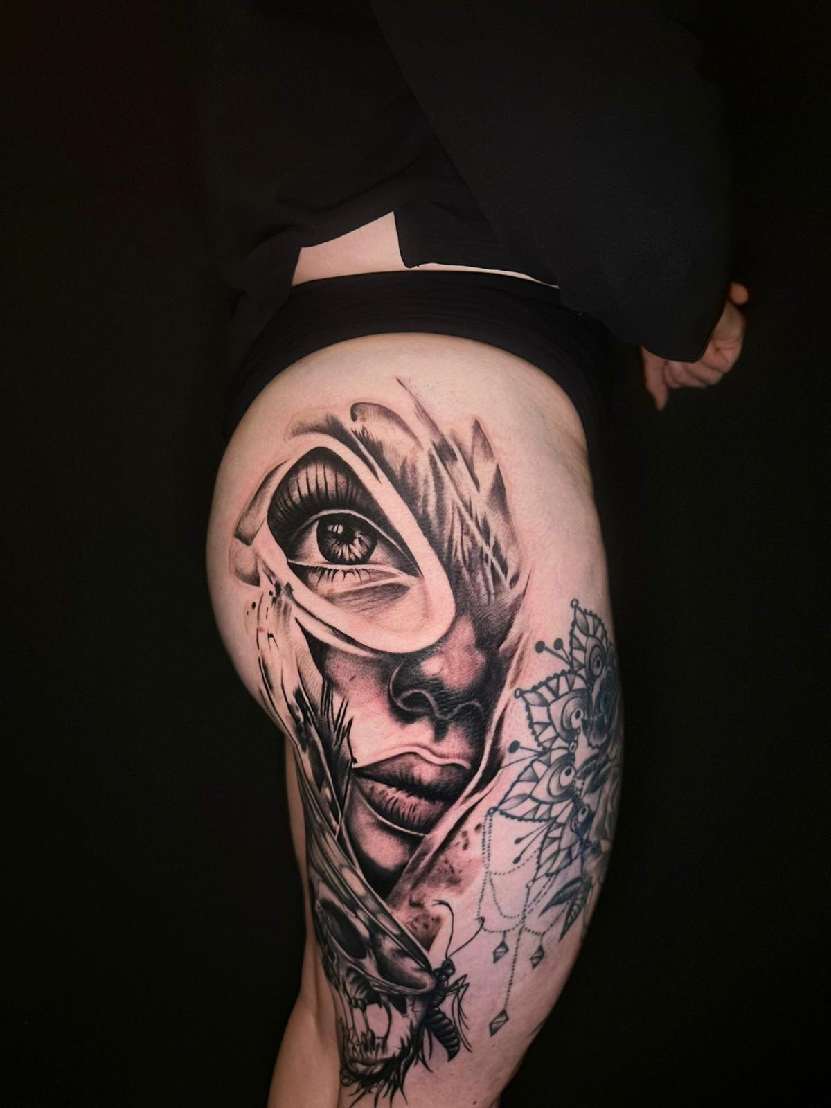 Tätowierung aus dem Archiv von Déjà Vu Tattoo