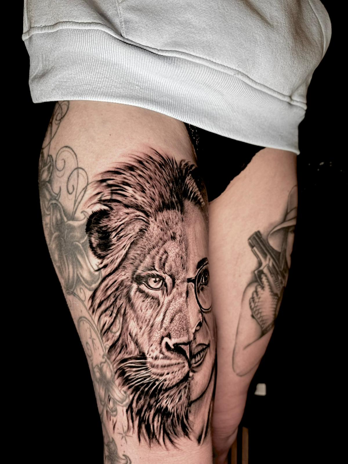 Black and grey portrait tattoo